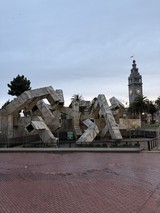 Vaillancourt Fountain and Ferry Building Clock Tower on Overcast Day