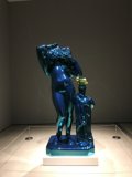 Woman atop Blue Statue