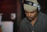 Grey-Shirted Man with Headphones