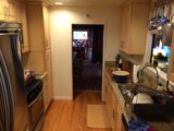 A Modern Kitchen with Hardwood Flooring