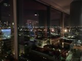 City Nightscape from High-Rise Window