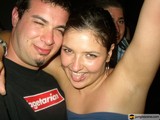 Party Portrait: Smiling Bride and Groom with Friend