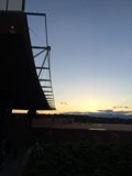 Serene Sunset View from Building with Bridge