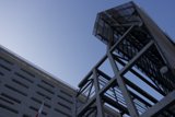 Metal Skyscraper Against Blue Sky