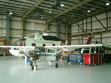 Helicopter Amongst the Aircraft in Hangar