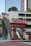 Pink Urban Building with Staircase and Handrail
