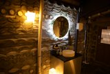 Elegant Simplicity: The Wood and Plant Accent Bathroom