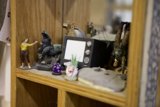 Wooden Shelf with Figurines and Toys