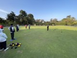 A Leisurely Game of Bowls on a Sunny Day
