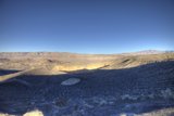 Desert Plateau with Distant Mountains