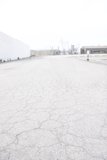 Parking Lot with White Building