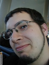Portrait of a Happy Man with Glasses