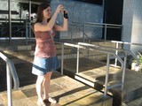 Tourist Photographer Capturing Moments on Museum Steps