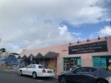 Rainbow Over Storefront in Honolulu