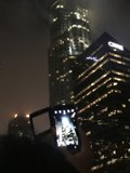 Nighttime Cityscape of Two Towers