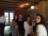Friends Gathering at a Stylish Urban Restaurant