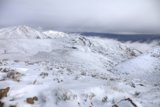 Majestic Mountain Peaks Covered in a Blanket of Snow