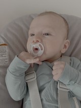 Baby in Car Seat with Pacifier