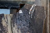 Rusty Tar-Coated Wood