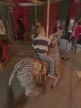 Medieval Reenactment Performance with Striped Costumes