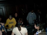 Nightclub Performance with DJ and Group of People