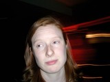 Redheaded Woman in Urban Night
