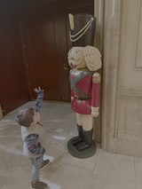 Child Discovers Life-Sized Nutcracker Holiday Decoration