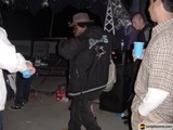 Dancing Man in Black Jacket and Hat