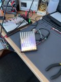 A Computer Setup Amidst a Mass of Wires