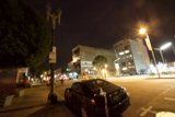 Parked Car on the Busy Street