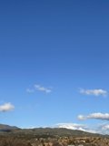 Kite soaring over picturesque Santa Fe hill
