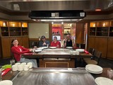 Friends Dining at Japanese Teppanyaki Restaurant