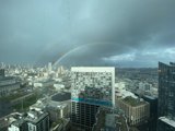 Spectacular Double Rainbow over San Francisco's Urban Skyline