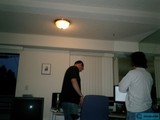 Two Men in an Electronics-filled Room