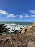 Rocky Cliffs Meet Azure Waters
