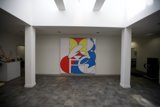 A Grand Painting in a Bare Room