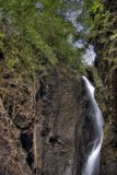 Majestic Waterfall in the Heart of the Woods