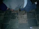 Kneeling on Flagstone