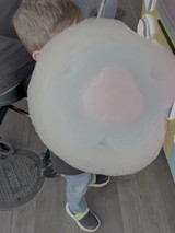 Child with Giant Cotton Candy Cloud