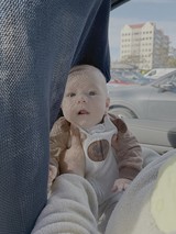 Baby's First Car Ride in Sunlight