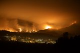 Devastating Wildfire in the Mountains and Cityscape