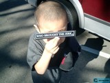 The Young Sign Holder