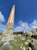Towering Above: A Man and the Jenner Lighthouse