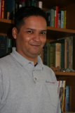 A Man Reading in the Library
