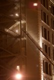 Nighttime Firefighting on Building Roof