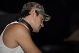 Party Man with Headgear and Earbuds