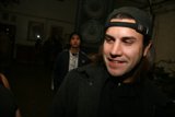 The Smiling Man in the Hat