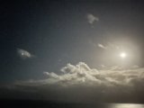 Full Moon over a Cloud-Filled Sky