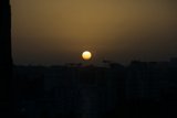 Setting Sun Behind Egyptian Metropolis
