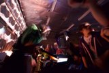 The Green Shirted Deejay Rocking the Night Club